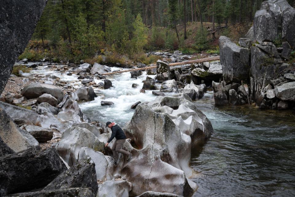 Wesley Keller (Watershed Division project leader for the Nez Perce Tribe) climbs Devil’s Bathtub at the confluence of East Fork South Fork Salmon River and Johnson Creek on Sept. 27, 2023, near Yellow Pine, Idaho.