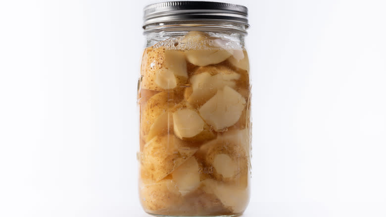 Pickled potatoes in jar
