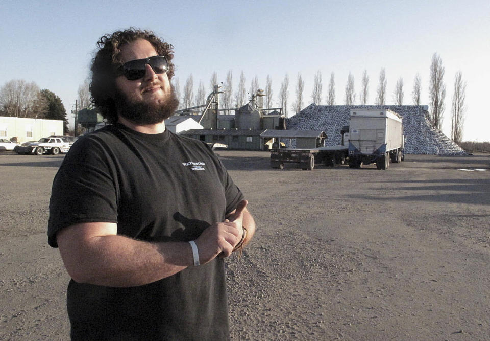 Ina Thursday, Jan. 16, 2014 photo, almond farmer Michael Fondse, 27, talks about the problem of theft at Fondse Brothers Inc., his family orchard and processing plant in Ripon, Calif. While neighboring farms have lost nuts by the ton, thieves have stolen from him fuel, machine parts, truck batteries and copper wire. To combat crime, they’ve installed fences, lights and surveillance cameras. (AP Photo/Scott Smith)