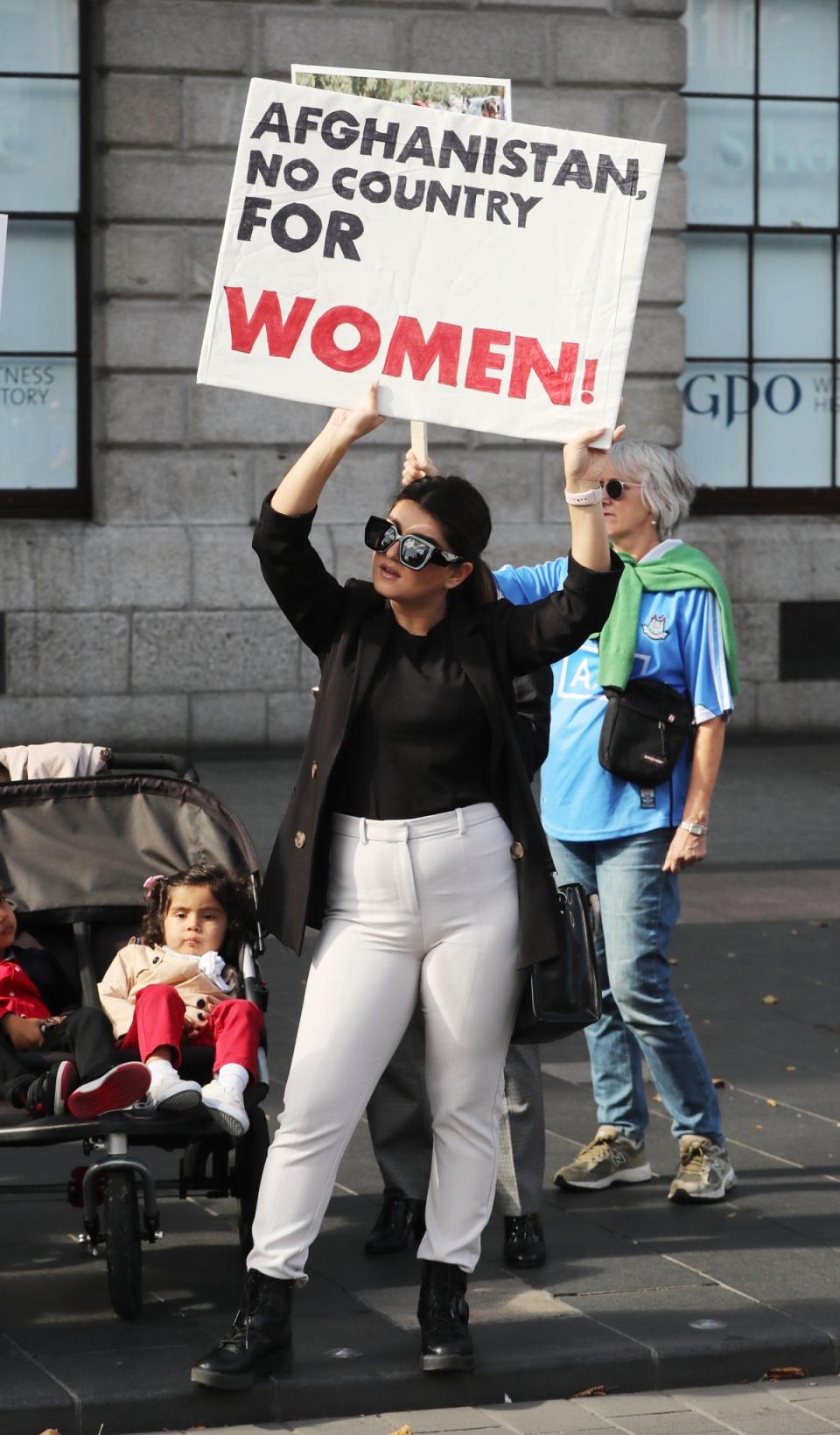 A woman attends a protest against Taliban persecution of women on Dublin’s O’Connell Street (Niall Carson/PA) (PA Archive)