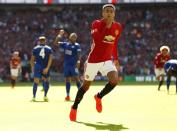 Football Soccer Britain - Leicester City v Manchester United - FA Community Shield - Wembley Stadium - 7/8/16 Manchester United's Jesse Lingard celebrates scoring their first goal Action Images via Reuters / John Sibley Livepic EDITORIAL USE ONLY. No use with unauthorized audio, video, data, fixture lists, club/league logos or "live" services. Online in-match use limited to 45 images, no video emulation. No use in betting, games or single club/league/player publications. Please contact your account representative for further details.