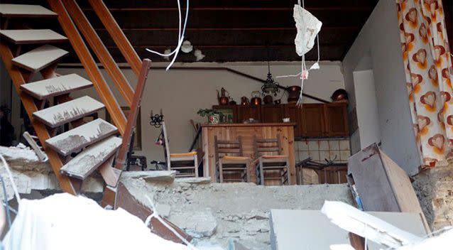 The interior of a house is seen after a quake in Amatrice, central Italy. Photo: Reuters/Remo Casilli