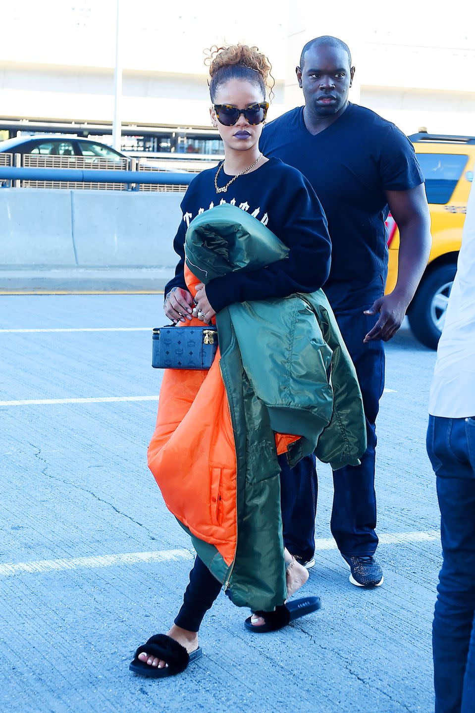 <p>Although classic Adidas slides made a huge comeback, more dressed-up versions, including ones with furry or embellished details on the strap, also became popular. Rihanna got in on the luxe-but-casual trend while out in New York City. </p>