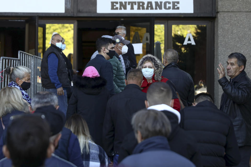 People wait in lines to get a vaccine in Sarajevo, Bosnia, Saturday, Sept. 25, 2021. Public mistrust of authorities in corruption-plagued Bosnia has created an opening for anti-vaccination movement even though the Balkan nation has the highest rate in Europe of coronavirus deaths and faces a growing number of new infections. So far, despite an abundance of coronavirus vaccines in Bosnia, just under 13 percent of its 3.3 million people had been fully immunized against Covid-19. (AP Photo)