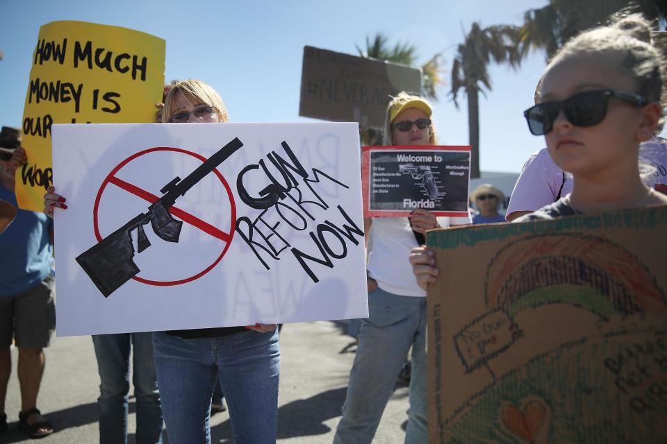 Activists protest in front of Kalashnikov USA, a gun manufacturer that makes an AK-47 rifle: Getty Images