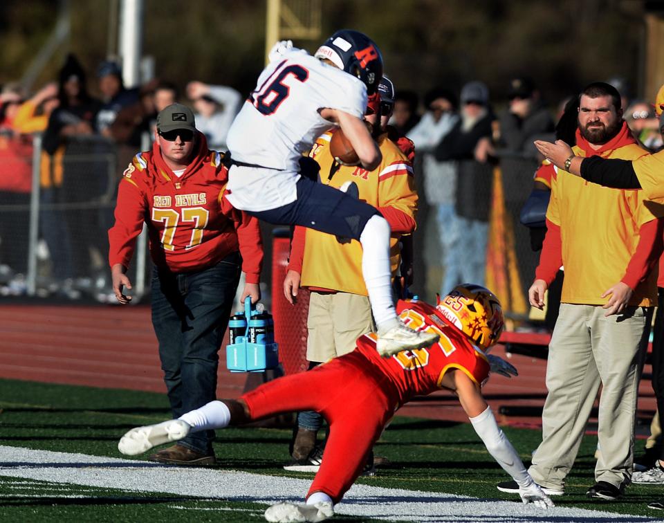 Rochester's Mason Jacobs runs the ball during the game against Murphysboro Saturday, Nov. 18, 2023.