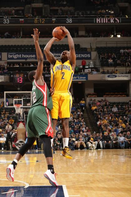 INDIANAPOLIS, IN - MARCH 12: Rodney Stuckey #2 of the Indiana Pacers shoots against Khris Middleton #22 of the Milwaukee Bucks on March 12, 2015 at Bankers Life Fieldhouse in Indianapolis, Indiana. (Photo by Ron Hoskins/NBAE via Getty Images)