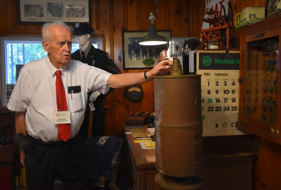 Don Inman displays an 800-pound steam whistle once used at Aliquippa Works at the Beaver County Industrial Museum on Aug. 20, 2023.