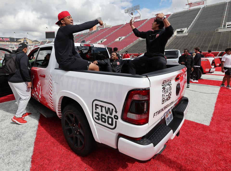 Utah Utes scholarship football players get in a truck