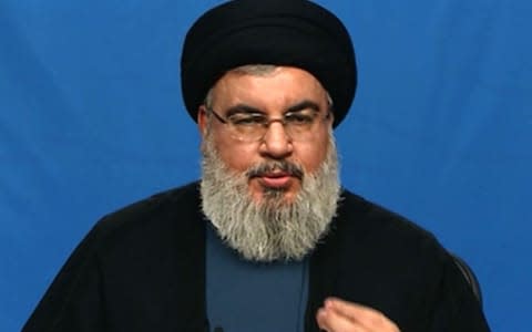 Hassan Nasrallah, leader of Shia group Hizbollah, tells fighters to avenge the killings - Credit: AFP