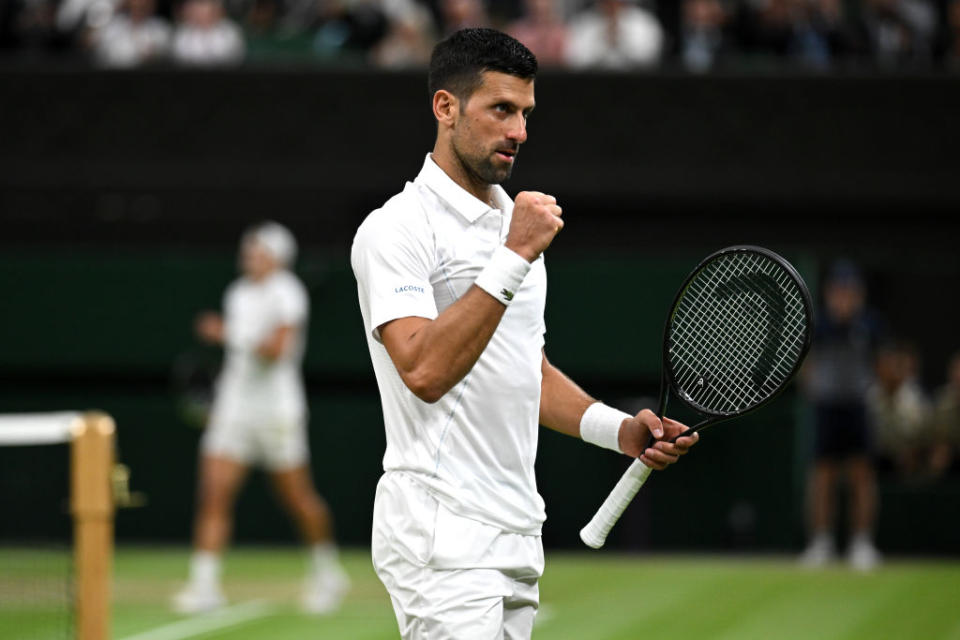 LONDON, ENGLAND - JULY 08: Novak Djokovic of Serbia celebrates winning match point against Holger Rune of Denmark in his Gentlemen's Singles fourth round match during day eight of The Championships Wimbledon 2024 at All England Lawn Tennis and Croquet Club on July 08, 2024 in London, England. (Photo by Mike Hewitt/Getty Images)