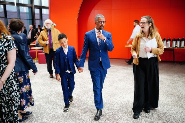 Vaughan Gething arrives with his son Isaac, at Cardiff University, after being elected as the next Welsh Labour leader