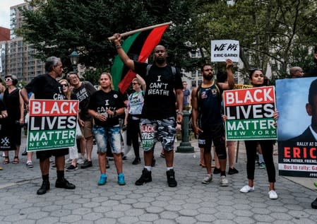 Protesters march and rally on the fifth anniversary of the death of Eric Garner in New York