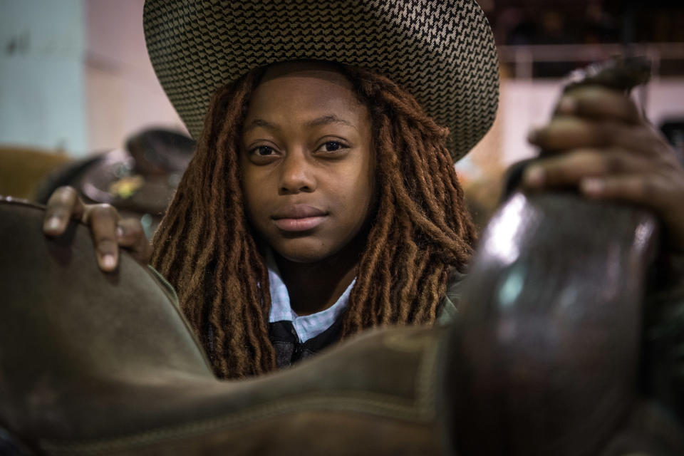 <p>ReRe, a young cowgirl poses for a portrait at the Black Heritage Rodeo in Greenville, Miss., January 2018. (Photograph by Rory Doyle) </p>
