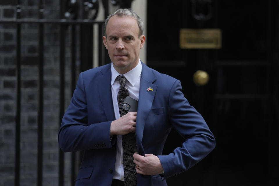 FILE - Britain's Deputy Prime Minister Dominic Raab leaves 10 Downing Street in London, Wednesday, March 23, 2022. A spokesperson says U.K. Prime Minister Rishi Sunak is reviewing a report about whether his top deputy bullied civil servants. (AP Photo/Alastair Grant, File)