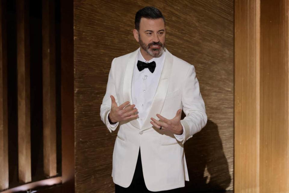 Host Jimmy Kimmel in a bow tie speaks onstage during the 95th Annual Academy Awards