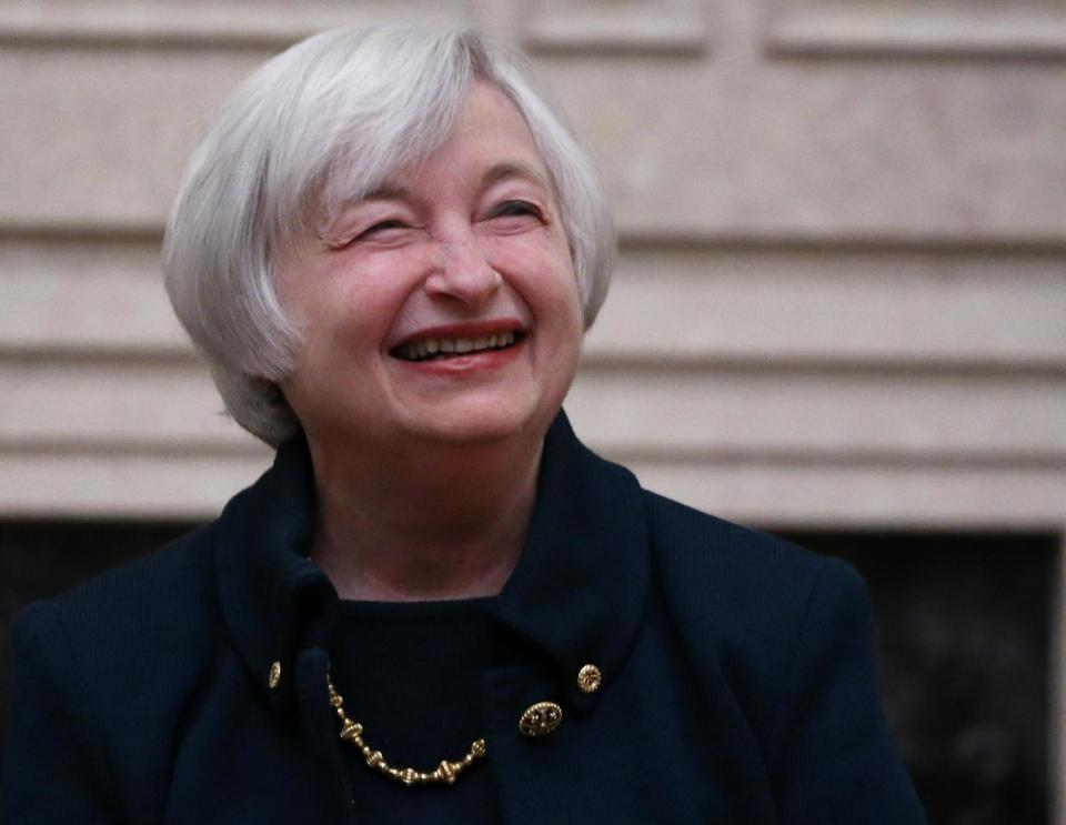 Janet Yellen smiles after being sworn in as Federal Reserve Board Chair, Monday, Feb. 3, 2014, in Washington, Yellen is the first woman to lead the Federal Reserve. (AP Photo/Charles Dharapak)