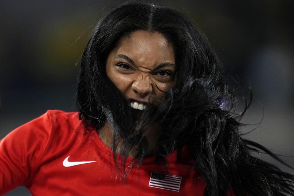 Tara Davis-Woodhall, of the United States, while competing in the women's long jump during the World Athletics Indoor Championships at the Emirates Arena in Glasgow, Scotland, Sunday, March 3, 2024. (AP Photo/Bernat Armangue)