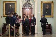 Personal attorney to President Donald Trump, Jay Sekulow, center, talks to reporters outside the Senate chamber, during the impeachment trial against President Donald Trump in the Senate at the U.S. Capitol in Washington,(AP Photo/Steve Helber)