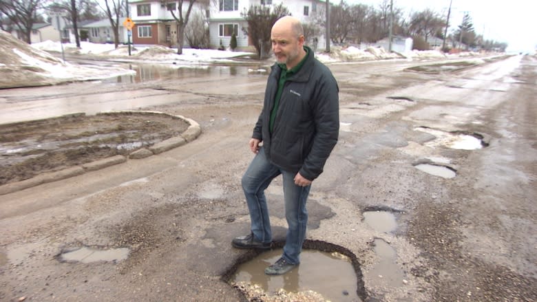 'It's like a war zone': businesses describe potholes on St. Matthews Avenue