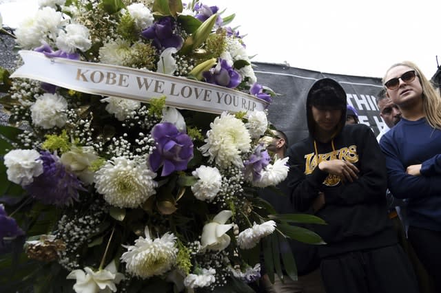 A floral wreath honouring Kobe Bryant appears outside Staples Center in Los Angeles