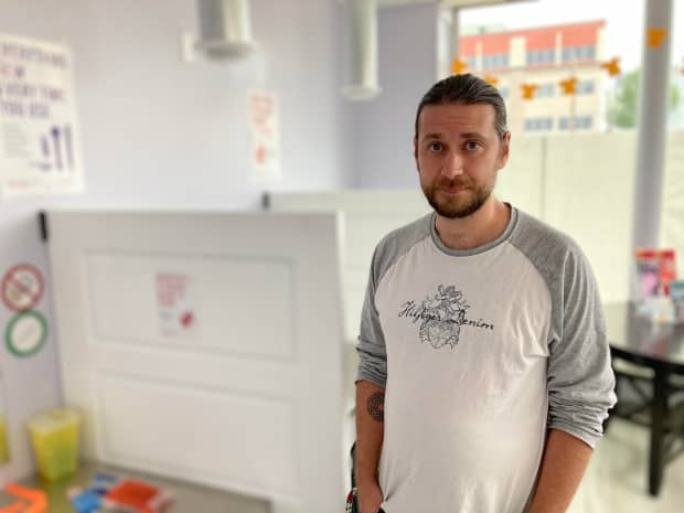 Michael Parker stands inside the Nēwo Yōtina Friendship Centre, which now has rapid testing which can detect potent drugs that may be unknowingly laced into other substances and reduce dangerous overdoses in the community.  (Matt Duguid/CBC News - image credit)