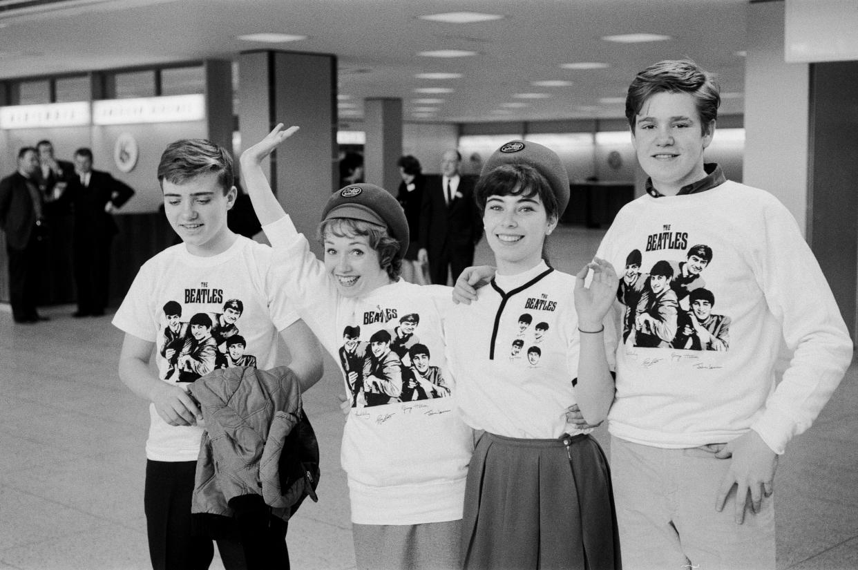 Fans decked out in Beatles merch