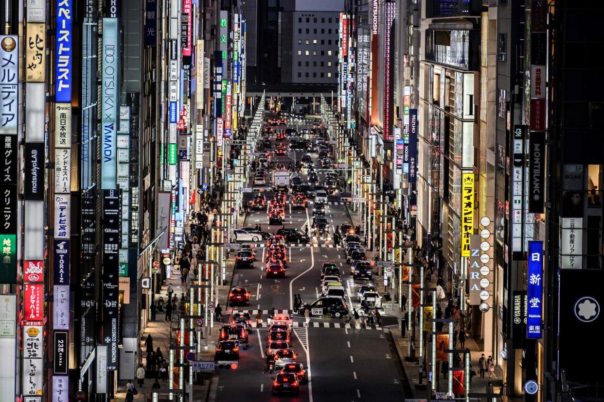 <span>A general view of Tokyo's Ginza area, where masked gang carried out a brazen daylight raid stealing dozens of luxury watches. </span><span>Photograph: Charly Triballeau/AFP/Getty Images</span>