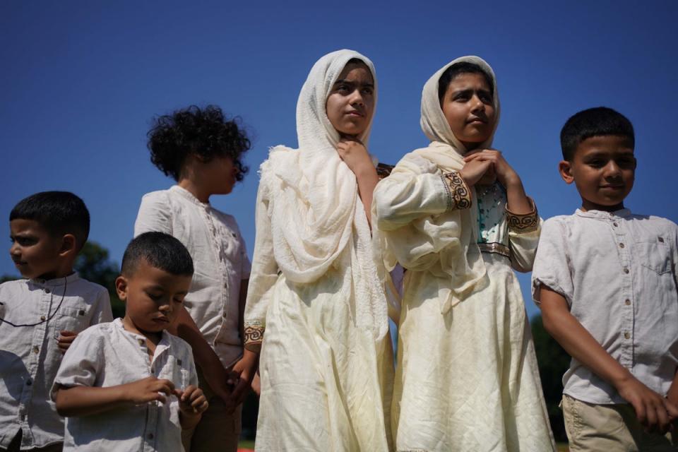 Children at morning prayer during Eid al-Adha in Southall Park, Uxbridge, in 2021 (PA Media)