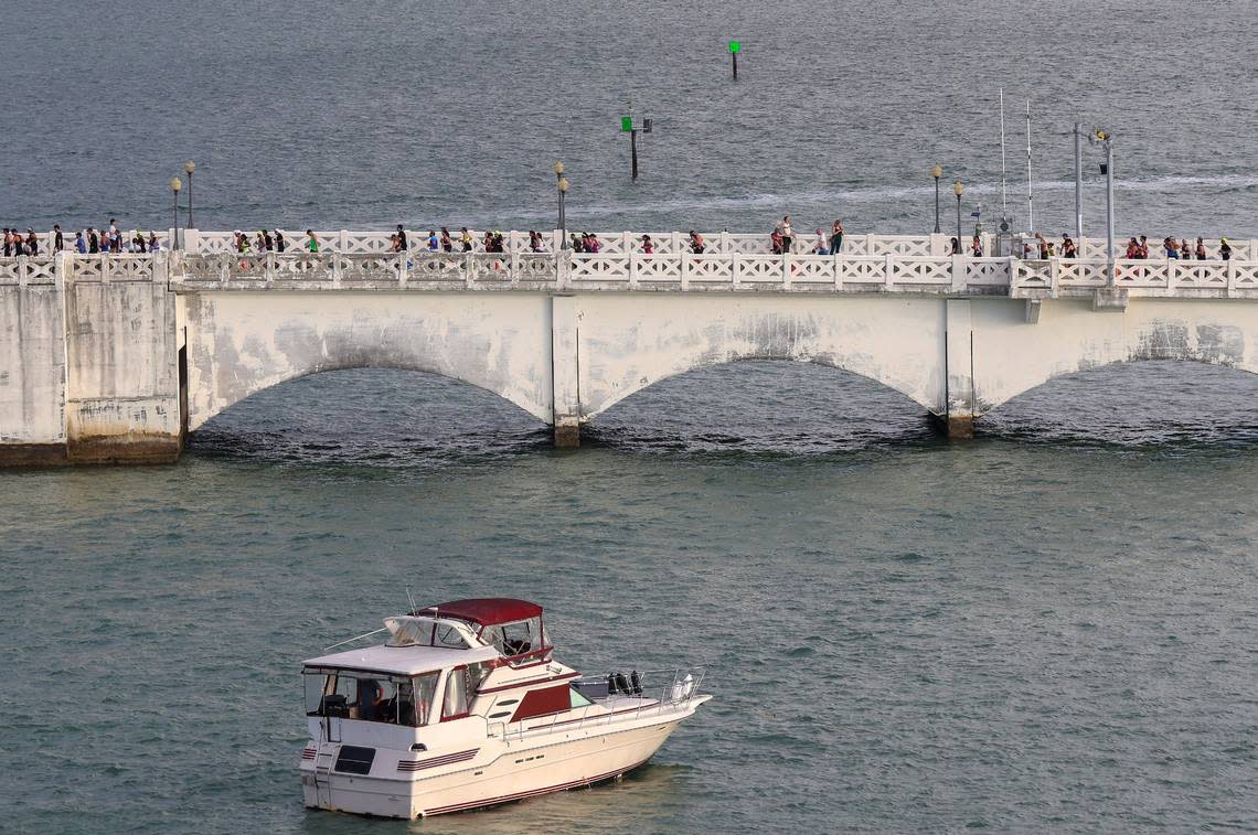 Some of the 12,000 runners make their way westbound on the Venetian Causeway toward Miami as they participated in the Life Time Miami Marathon and Half Marathon on Sunday, Jan. 29, 2023, in Miami.