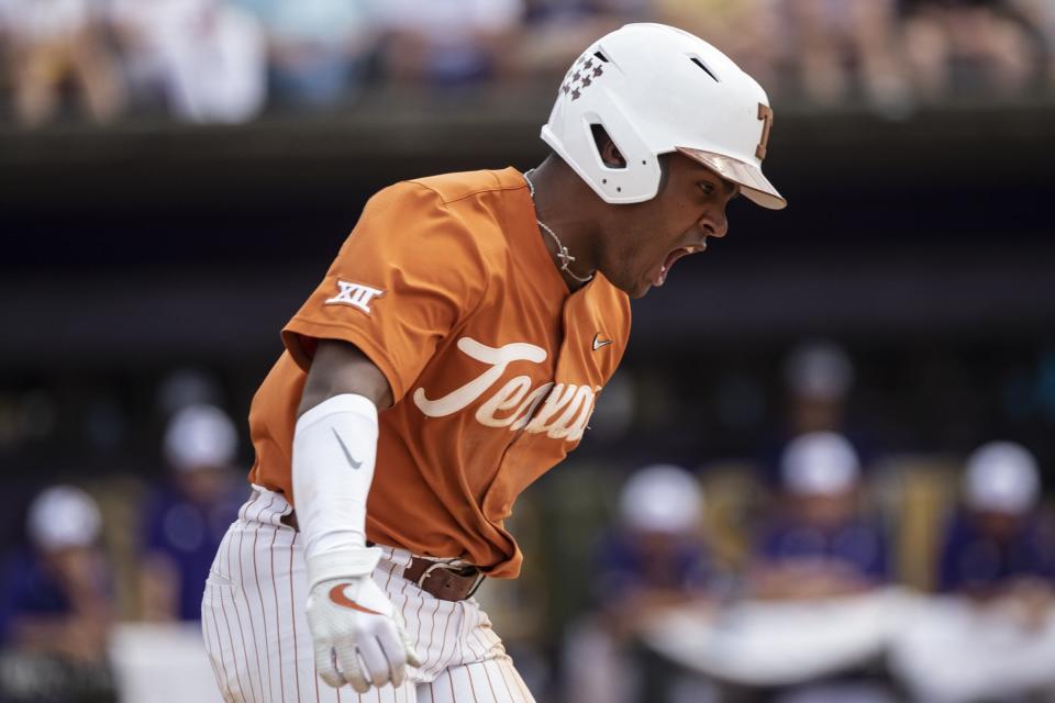 Dylan Campbell shouts in triumph after hitting a home run to put Texas ahead 8-7 in the eighth inning Saturday. One inning later, he delivered a walk-off single.