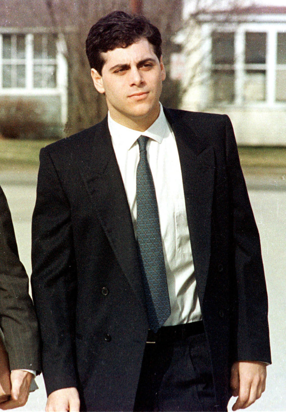 FILE - In this April 5, 1988 file photo, John Zaccaro Jr. walks to Vermont District Court in Rutland, Vt. The son of former vice presidential nominee Geraldine Ferraro has been pardoned by the governor of Vermont nearly 30 years after he was convicted of selling cocaine to an undercover officer. Outgoing Gov. Peter Shumlin, a Democrat, pardoned Zaccaro and nine others Saturday, Dec. 31, 2016. (AP Photo/Toby Talbot, File)