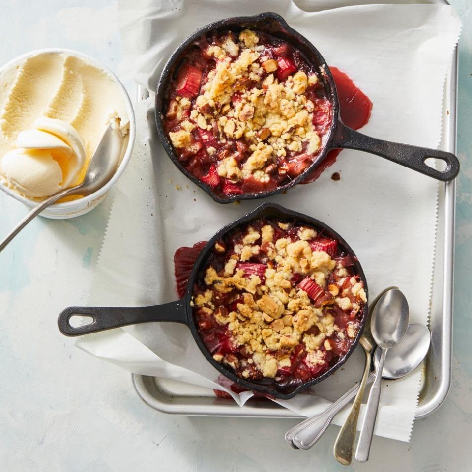 <p>Since there's no need to make a crust, this delicious combo of juicy berries and buttery topping comes together easily. Bake it in mini cast iron skillets for an adorable presentation!</p><p><em><a href="https://www.goodhousekeeping.com/food-recipes/a32020382/strawberry-rhubarb-crumble-recipe/" rel="nofollow noopener" target="_blank" data-ylk="slk:Get the recipe for Strawberry-Rhubarb Crumbles »;elm:context_link;itc:0;sec:content-canvas" class="link ">Get the recipe for Strawberry-Rhubarb Crumbles »</a></em></p><p><strong>RELATED: </strong><a href="https://www.goodhousekeeping.com/cooking-tools/g29993894/best-cast-iron-skillets/" rel="nofollow noopener" target="_blank" data-ylk="slk:9 Best Cast Iron Skillets of 2019;elm:context_link;itc:0;sec:content-canvas" class="link ">9 Best Cast Iron Skillets of 2019</a></p>