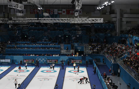 Curling - Pyeongchang 2018 Winter Olympics - Women's Round Robin - Gangneung Curling Center - Gangneung, South Korea - February 20, 2018 - Spectators watch session 10 of the Women's Round Robin. REUTERS/Cathal McNaughton