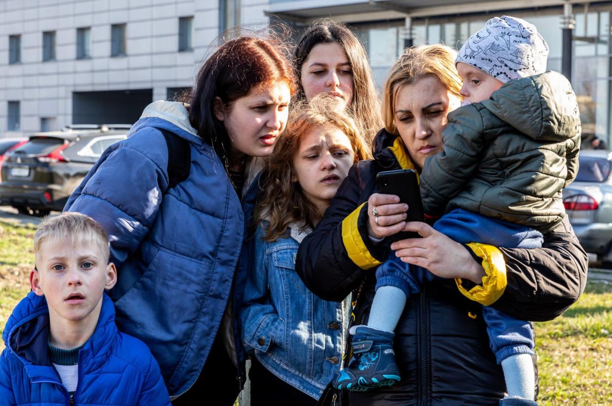 <span class="caption">Many Ukrainians returned home after fleeing the Russian invasion, including this family that arrived on April 12, 2022, in Lviv, Ukraine, from refuge in Poland.</span> <span class="attribution"><a class="link " href="https://www.gettyimages.com/detail/news-photo/ukrainian-family-arrives-early-in-the-morning-in-lviv-from-news-photo/1239977390?adppopup=true" rel="nofollow noopener" target="_blank" data-ylk="slk:Dominika Zarzycka/SOPA Images/LightRocket via Getty Images;elm:context_link;itc:0;sec:content-canvas">Dominika Zarzycka/SOPA Images/LightRocket via Getty Images</a></span>