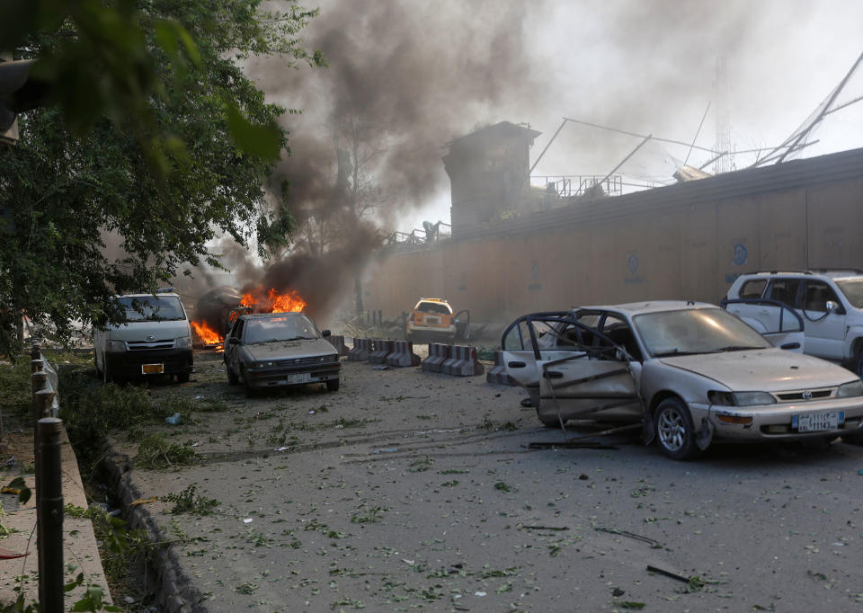 <p>Damaged cars are seen at the site of a blast in Kabul, Afghanistan May 31, 2017. (Omar Sobhani/Reuters) </p>