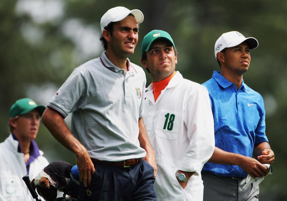 Tiger Woods and amateur Edoardo Molinari (L) of Italy with brother and caddie Francesco Molinari (C) on the fourth tee during the second round of The Masters at the Augusta National Golf Club on April 7, 2006 in Augusta, Georgia.  (Getty Images)