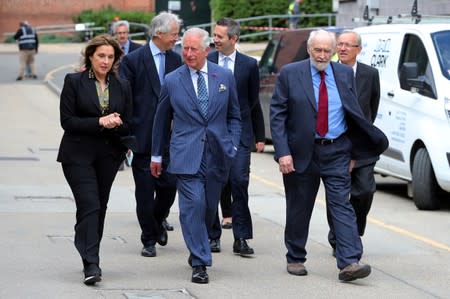 Britain's Prince Charles visits the set of James Bond at Pinewood Studios