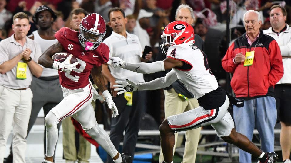 Alabama Crimson Tide wide receiver Ryan Williams breaks a tackle to score the game-winning touchdown. - Gary Cosby Jr./USA Today Sports/Reuters