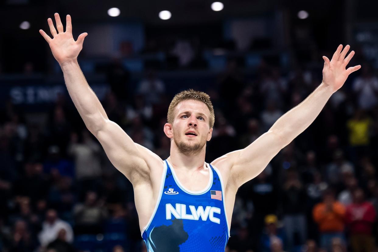 Jason Nolf reacts to the crowd after winning the 74 kilogram challenge round championship bout during the U.S. Olympic Team Trials at the Bryce Jordan Center April 19, 2024, in State College. Nolf defeated Jordan Burroughs by decision, 3-0.