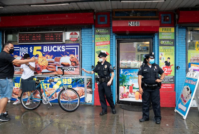 Camden County Police officers Natalie Perez and Alexander Baldwin patrol on the streets of Camden, New Jersey