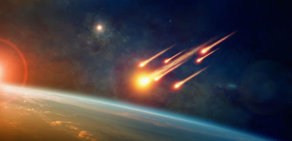 artist's rendition of a cluster of asteroids approaching the Earth