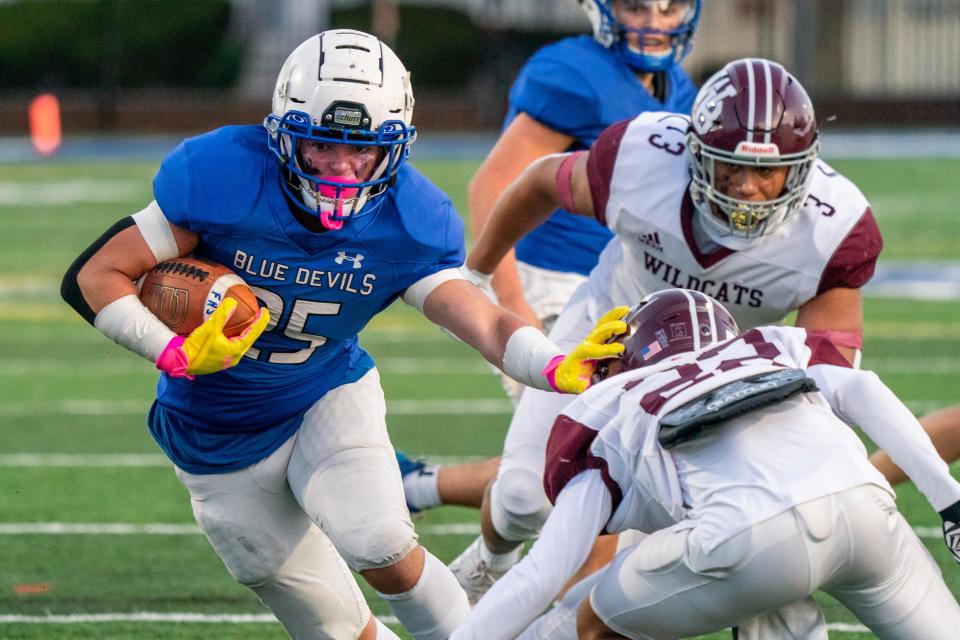 Justin Marques carries the ball against West Bridgewater.