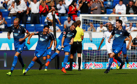 Soccer Football - Bundesliga - TSG 1899 Hoffenheim vs Schalke 04 - Rhein-Neckar-Arena, Hoffenheim, Germany - September 23, 2017 Hoffenheim’s Dennis Geiger celebrates scoring their first goal REUTERS/Michaela Rehle