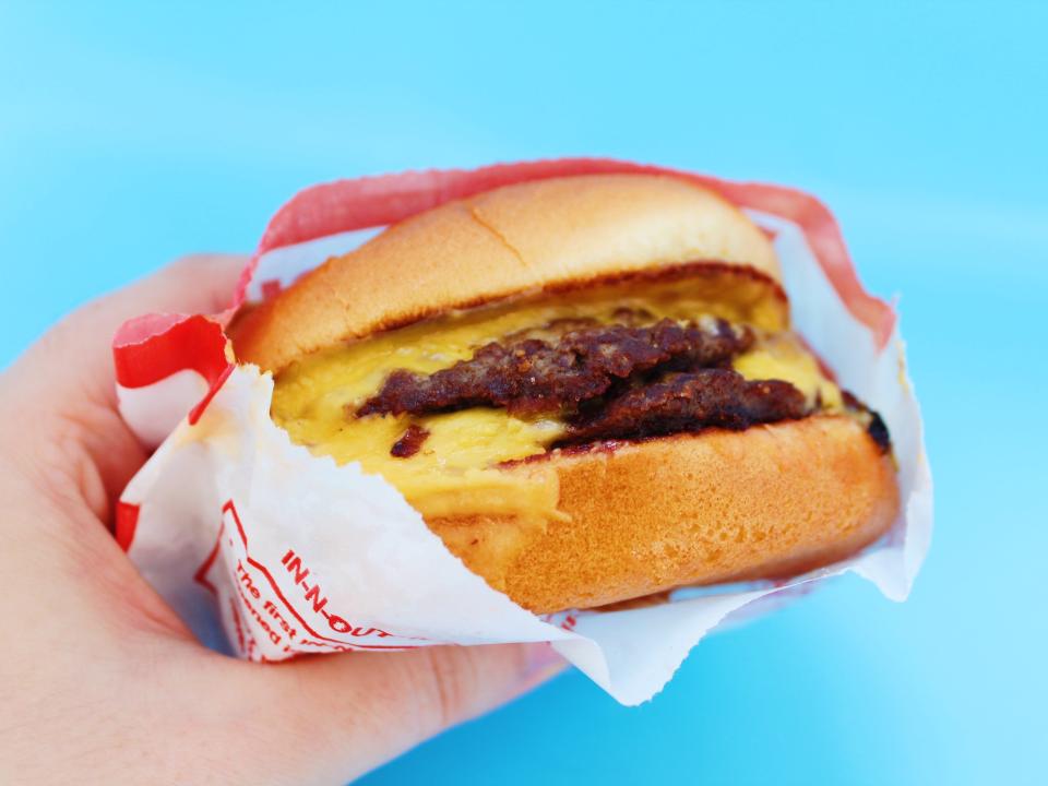 in n out double double on blue background