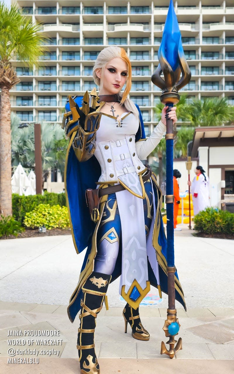 A Jaina Proudmoore cosplayer stands with a staff at Holiday Matsuri 2023.