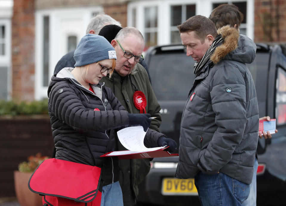 The Labour campaign team plan their tour in Hartlepool, England, Monday, Nov. 11, 2019. Hartlepool has elected lawmakers from the left-of-center Labour Party for more than half a century. But in 2016, almost 70% of voters here backed leaving the European Union. (AP Photo/Frank Augstein)