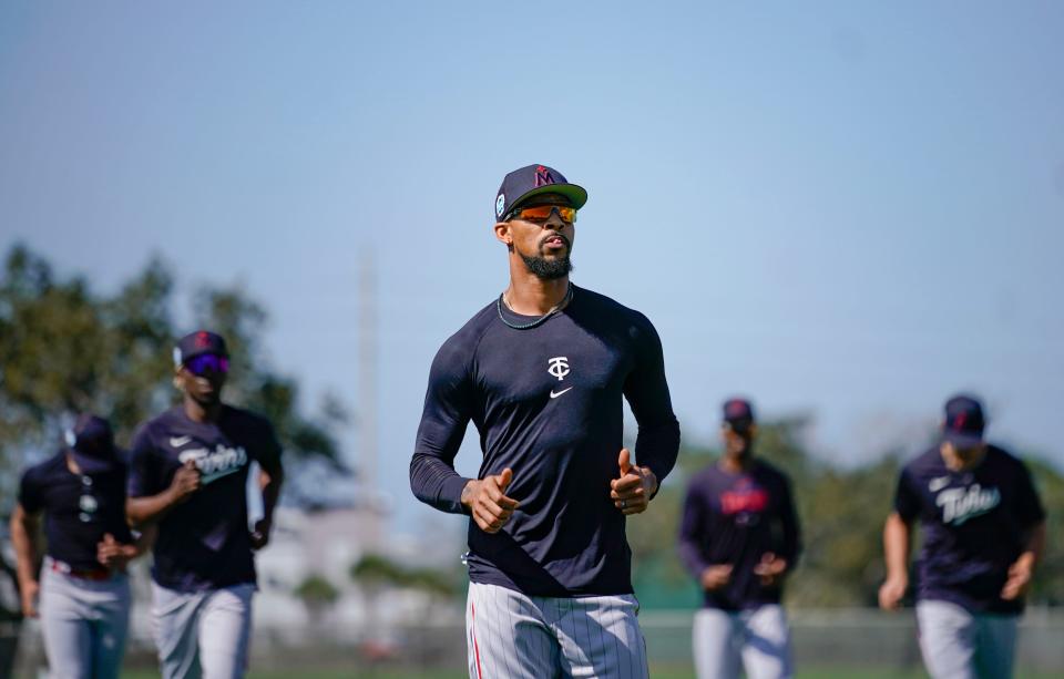 Outfielder Byron Buxton jogs while warming up during the first full-squad spring training workout for the Minnesota Twins at Hammond Stadium in Fort Myers on Monday, Feb. 20, 2023. 