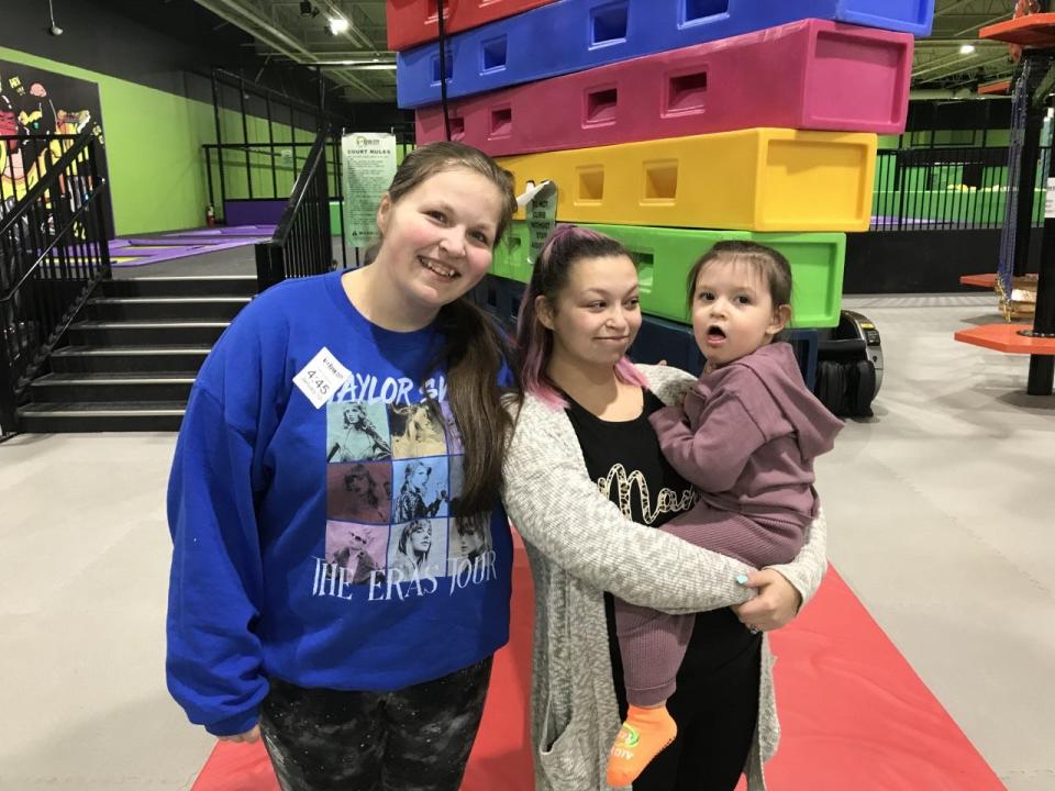 Tyler Urbanus, 22, her sister Adrianna Urbanus, 23, and her daughter Jazmine Urbanus, 2, are all smiles as they describe their visit at the new Fun City Adventure Park at Taunton Depot on Jan. 10.
(Photo: Taunton Gazette/Ed Baker)