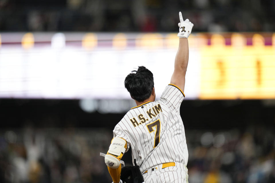 San Diego Padres' Ha-Seong Kim celebrates after hitting a walk-off home run during the ninth inning of a baseball game against the Arizona Diamondbacks, Monday, April 3, 2023, in San Diego. (AP Photo/Gregory Bull)